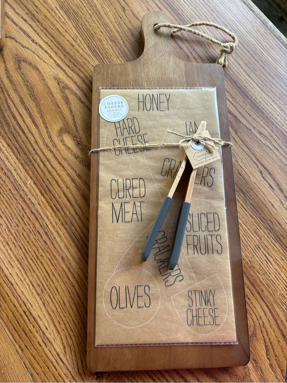 Wood Paddle Charcuterie Serving Board with Tongs & 12 pk. cheese Paper